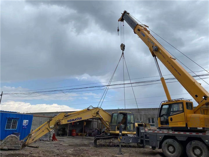 弥勒市25吨吊车的工作半径是多少？